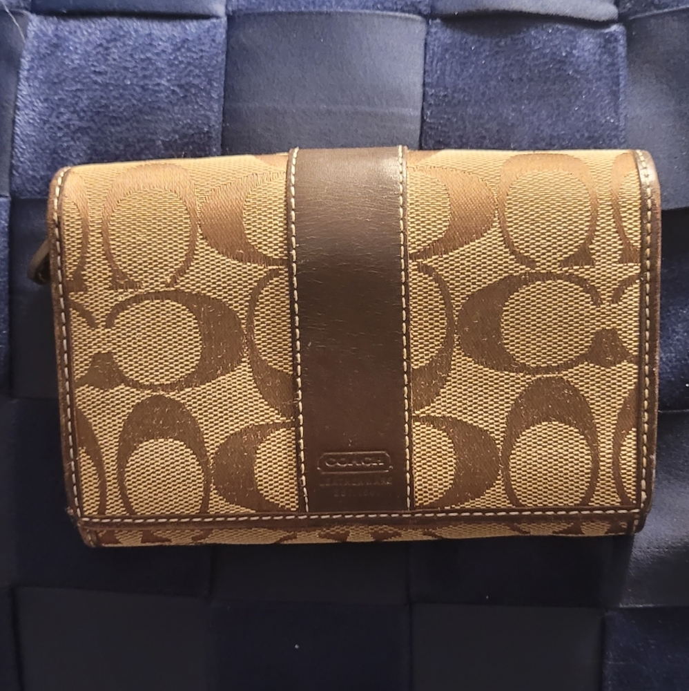 Coach Hampton Signature Wallet brown in color with smooth brown leather trim